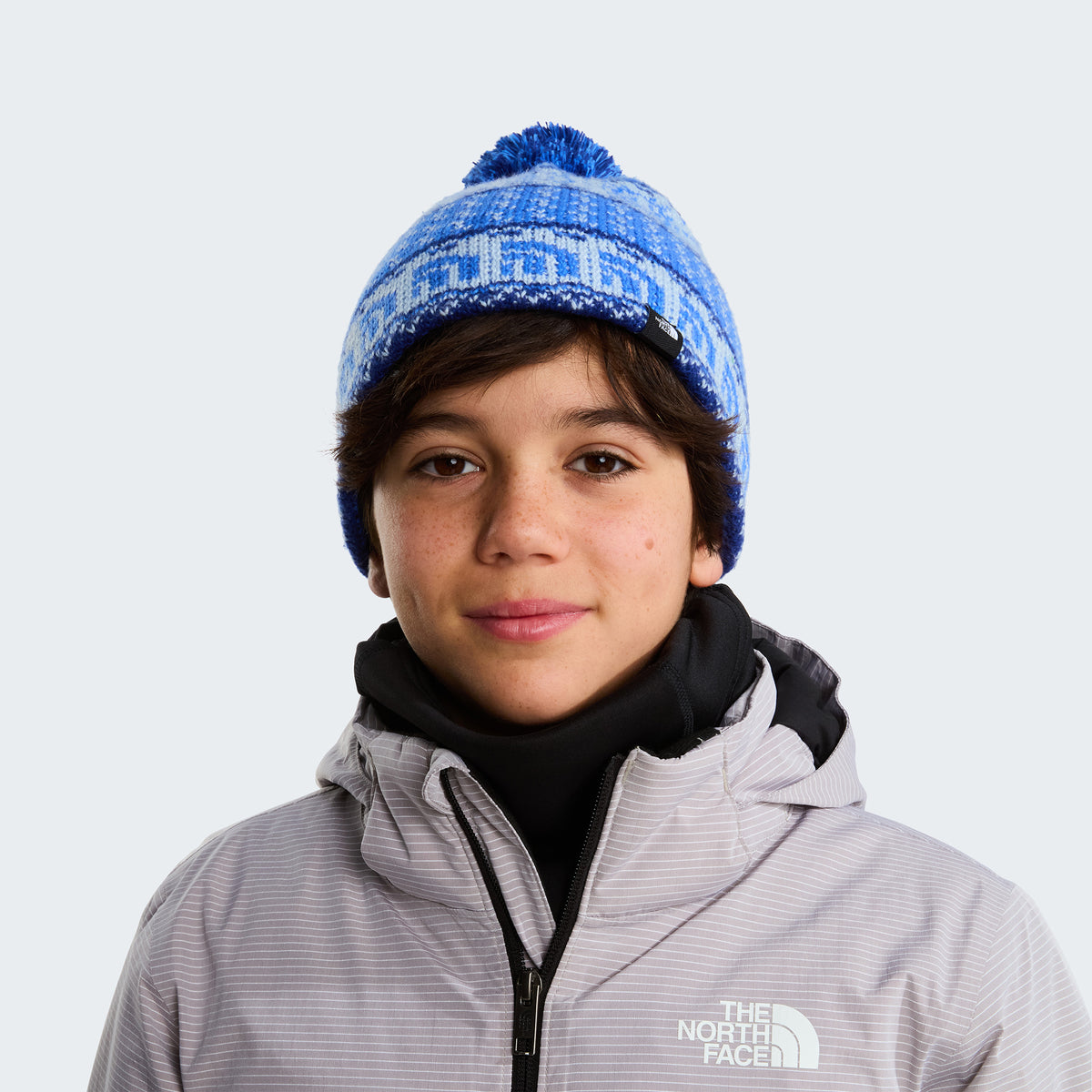 Bonnet à Pompon Enfant Cabin Ski Tuke bleu vif THE NORTH FACE