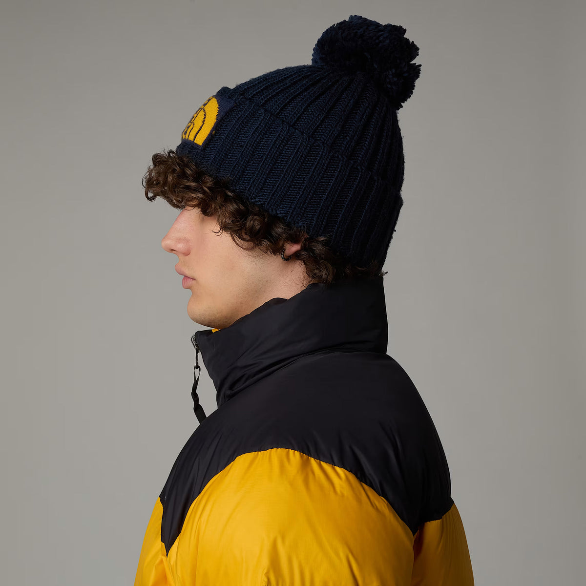 Bonnet à Pompon Recyclé Heritage Ski Tuke bleu marine-jaune THE NORTH FACE